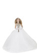 Bride girl in wedding gown holding crucifix looking up over white background