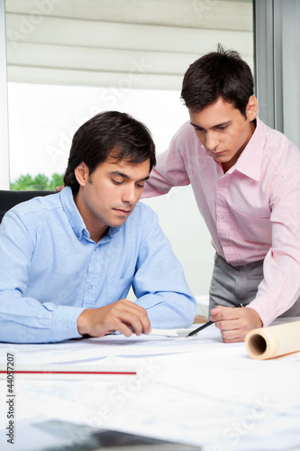 Photo: Architects Discussing Work Architects Discussing Work