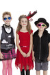 Portrait of school children wearing fancy dress outfits over white background