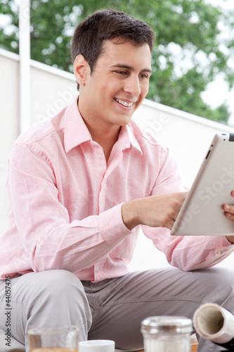 Foto: Young Architect Using Digital Tablet Young Architect Using Digital Tablet