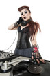 Photo: Portrait of beautiful punk DJ with sound mixing equipment over white background Portrait of beautiful punk DJ with sound mixing equipment over white background