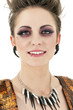 Photo: Portrait of beautiful young punk woman over white background Portrait of beautiful young punk woman over white background