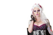Portrait of beautiful young woman wearing wig while listening to mobile phone over white background