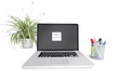 Sticky notepaper stuck on laptop screen in office