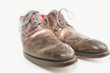 Close-up of men's leather shoe over white background