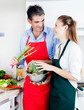 Photo: Man and Woman Cooking in Kitchen Man and Woman Cooking in Kitchen