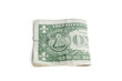 Close-up of paper dollars in clip over white background