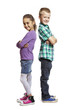 Photo: Boy and girl stood back to back Boy and girl stood back to back