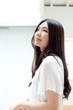 Photo: Beautiful young woman relaxing in the room Beautiful young woman relaxing in the room