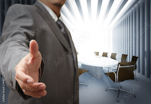 Photo: Business man and meeting table background Business man and meeting table background