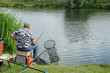France, a fisherman near Sautour pond in Les Mureaux