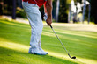 Photo: Man playing golf Man playing golf