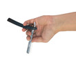 hand holding classic straight razor on white background