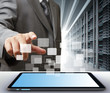 business man and tablet computer in server room