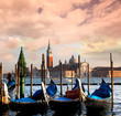 Photo: Venice with gondolas on Grand canal in Italy Venice with gondolas on Grand canal in Italy