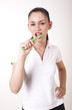 Young attractive girl cleaning her teeth