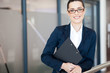 attractive young businesswoman portrait in office