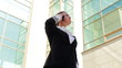 Young businesswoman calling by cellphone outdoor