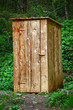 Photo: Rustic wooden toilet in the forest Rustic wooden toilet in the forest