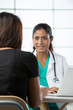 Doctor consulting with a patient.