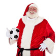 Weihnachtsmann hält Fußball