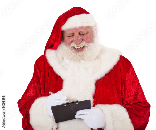 Photo: Weihnachtsmann notiert etwas Weihnachtsmann notiert etwas