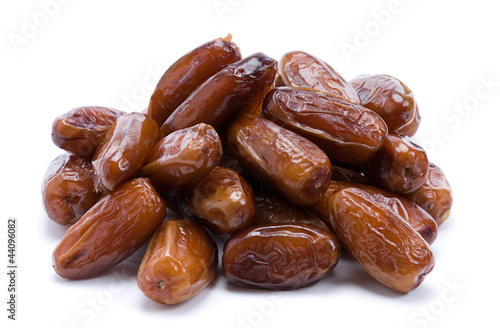 Photo: Dried dates over white background Dried dates over white background