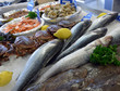Raw fish on market counter