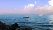 pescatore  e barca a vela in Toscana
