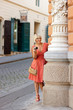 woman with camera on the street