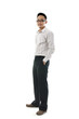 Full body of a smiling young Asian executive standing against is