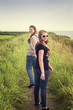 Photo: Two pretty teenagers walking on a dike Two pretty teenagers walking on a dike