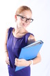 Pretty redhead woman with eyeglasses holding a folder
