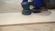 Video: man polishes pine wooden board man polishes pine wooden board