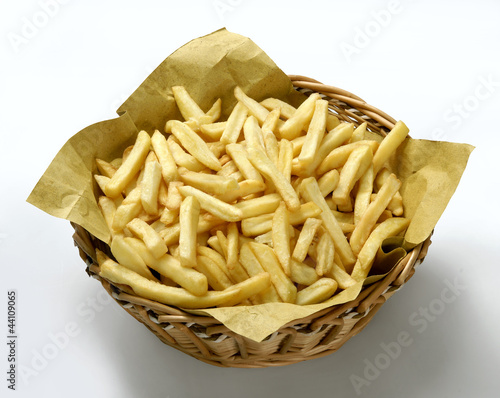 Photo: Patatine fritte in cestino e carta paglia Patatine fritte in cestino e carta paglia