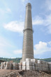 A new chimney against blue sky in a coking plant