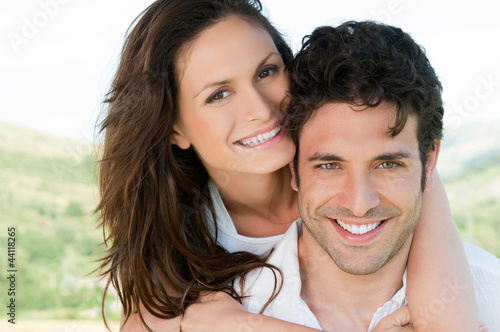 Foto: Loving couple piggyback Loving couple piggyback