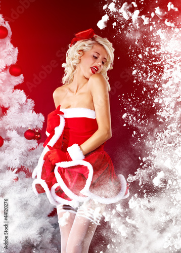 Photo: beautiful sexy girl wearing santa claus clothes beautiful sexy girl wearing santa claus clothes