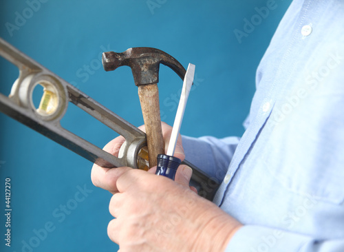 Photo: tools in a man's hand tools in a man's hand