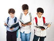 Photo: Three smart boys read books Three smart boys read books