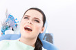 Happy patient came to the dentist and is ready for treatment