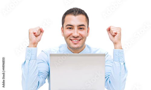 Photo: Portrait of an excited young man celebrating success Portrait of an excited young man celebrating success