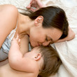 Mother is breast-feeding baby older than one year