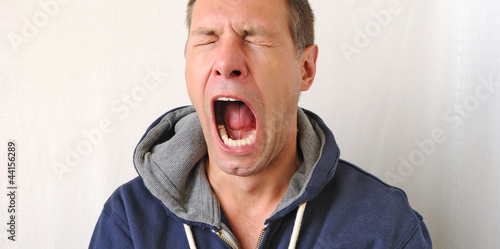 Photo: Portrait of the yawn man Portrait of the yawn man
