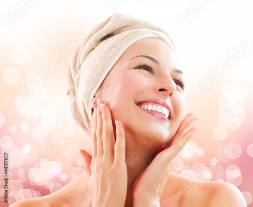 Photo: Beautiful Girl After Bath Touching Her Face. Skincare Beautiful Girl After Bath Touching Her Face. Skincare