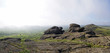Beautiful misty mountain landscape, boulders, morning