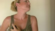 Video: Woman applying perfume Woman applying perfume