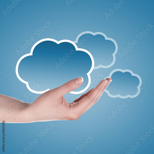 Photo: Hand with cloud computing symbol Hand with cloud computing symbol