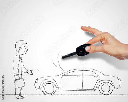 Photo: Car and key and man standing near Car and key and man standing near