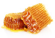 sweet honeycombs with honey, isolated on white